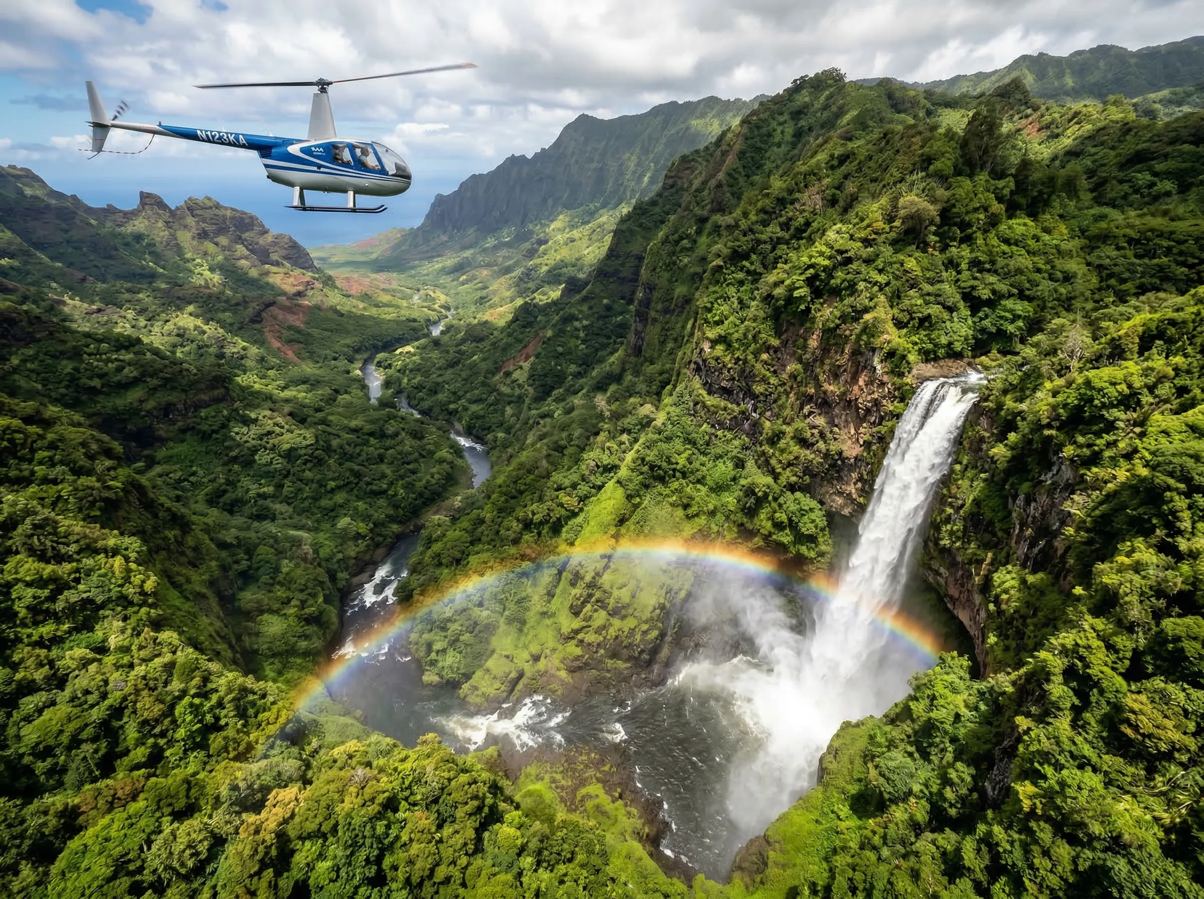 Dramatic waterfall from a helicopter, rainbow in the mist