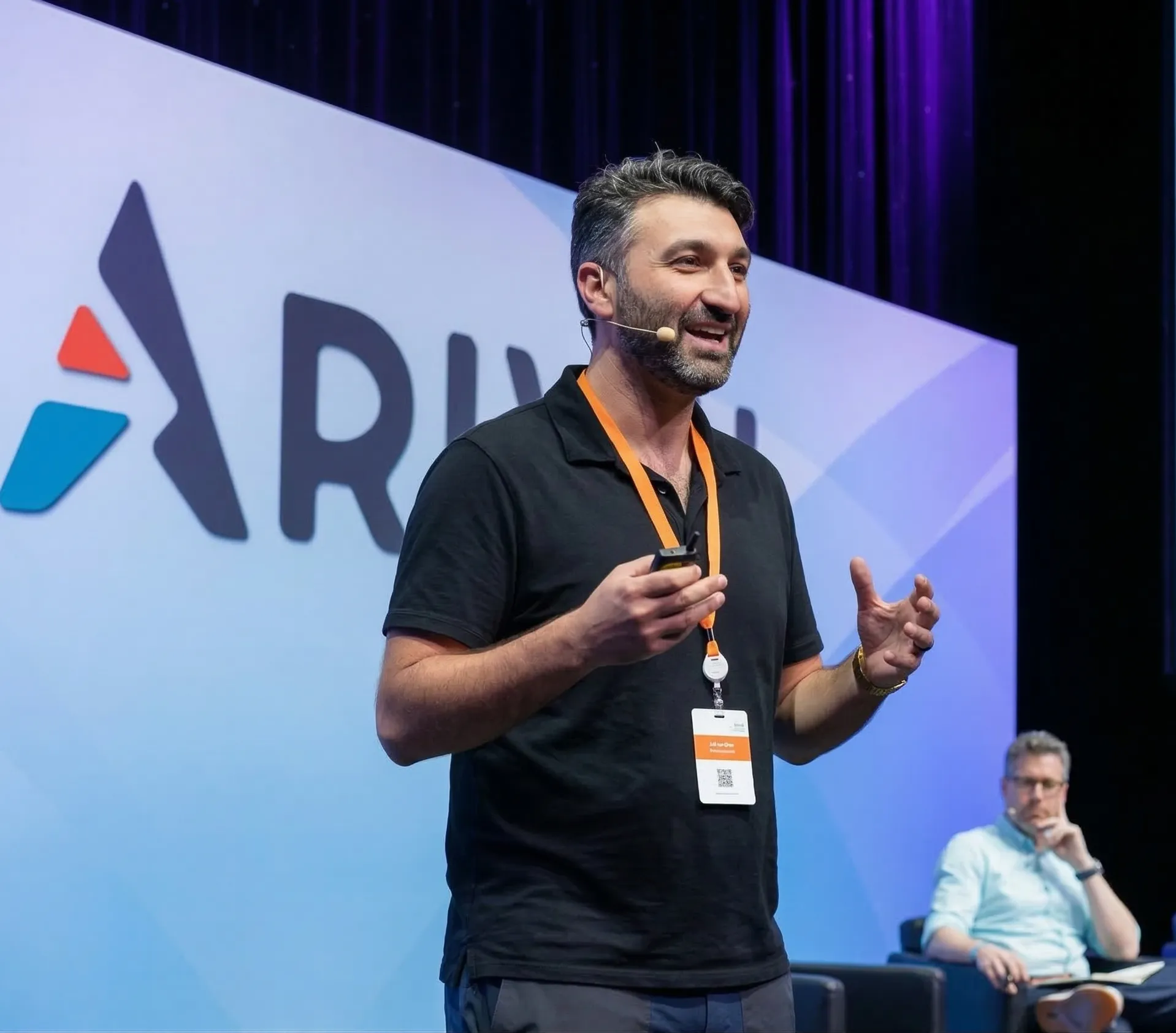 Vitaliy Levit speaking at Arival conference